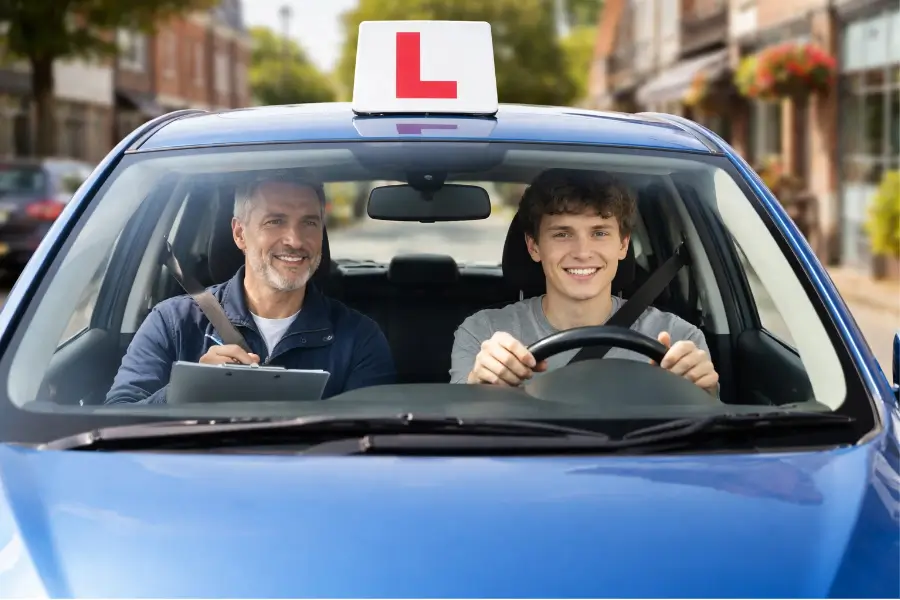 Safe Drive UK Driving School Instructor with Learner Driver in Car looking ahead through windscreen